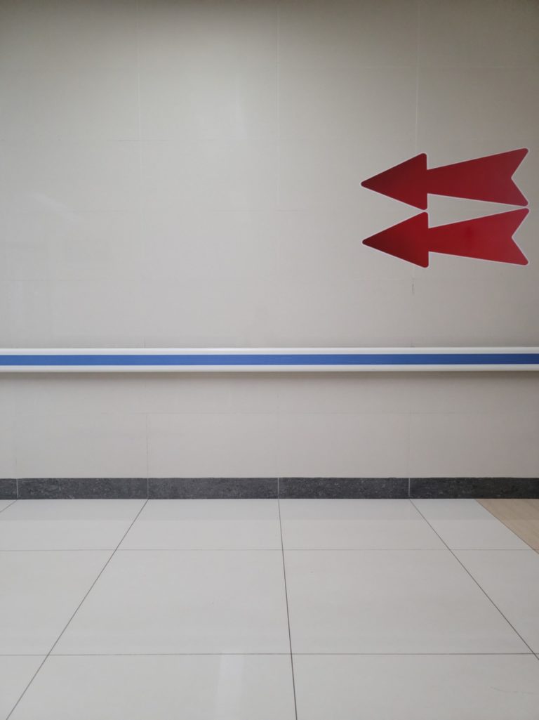 red arrow on wall